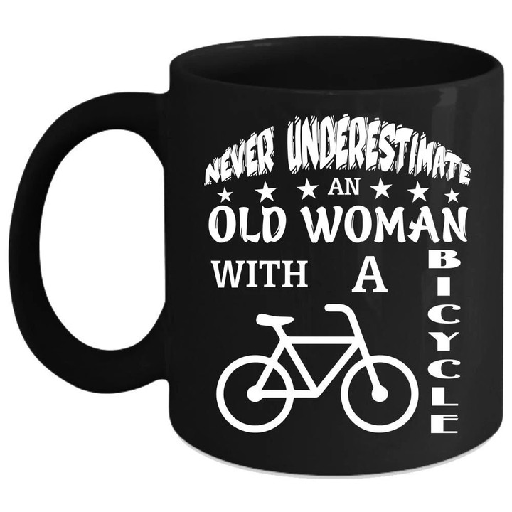 An Old Woman With A Bicycle Black Ceramic Mug