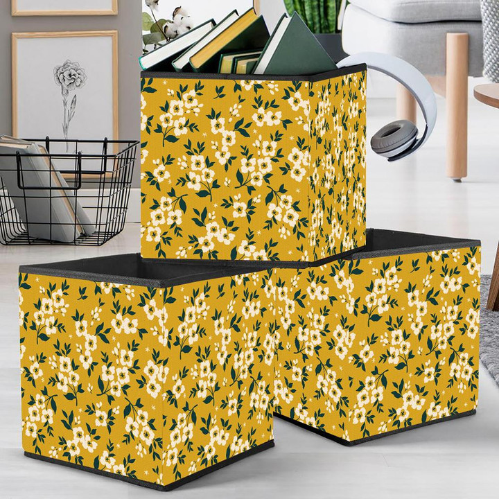 Trendy Small White Flowers And Leaves On Yellow Background Storage Bin Storage Cube