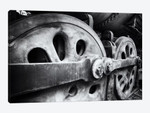 Close Up View Of Wheels Of A Steel Locomotive