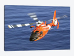 A Coast Guard HH-65A Dolphin Rescue Helicopter In Flight