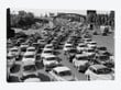 1950s Heavy Traffic Coming Off Of The Ben Franklin Bridge Driving From Camden NJ Into Philadelphia PA USA