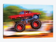Big Wheeled Red Truck Jumping Blurred Background