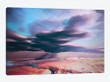A Swift Moving Thunderstorm Moves Over A Desert Landscape