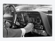 1960s Hand On Car Radio Dials And Steering Wheel