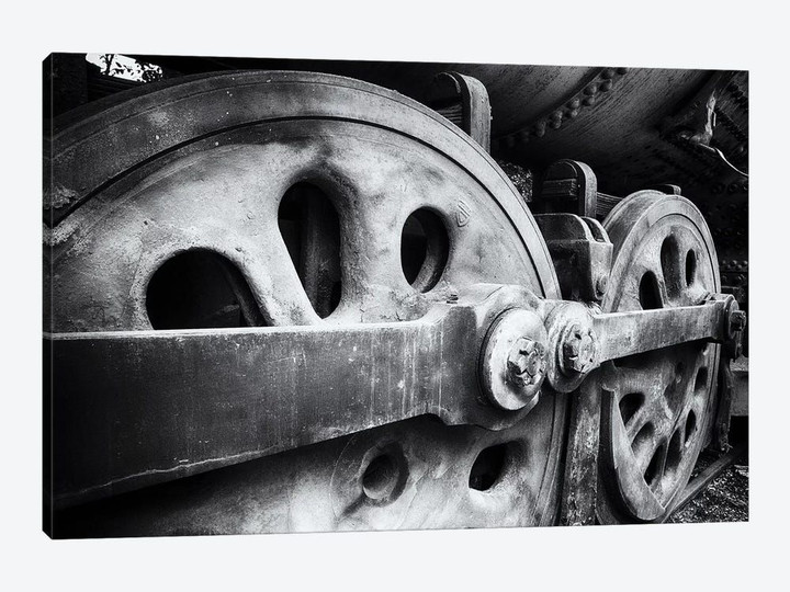 Close Up View Of Wheels Of A Steel Locomotive