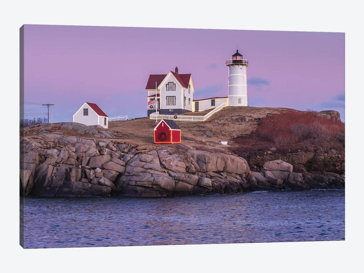 USA, Maine, York Beach. Nubble Light lighthouse at dusk