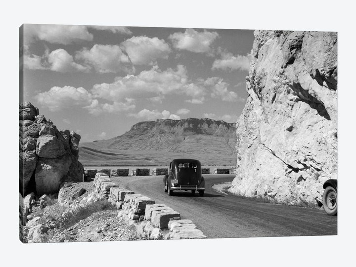 1930s-1940s Car Driving On Mountain Road In Yellowstone National Park Near Cody Wyoming USA