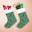 Dachshund Dog In Christmas Jumpers On Green Christmas Stocking