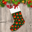 A Fstive Gifts Box With A Bow On Green Background Christmas Stocking