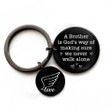 A Brother is God's way of making sure we never walk alone- Black Round Keychain