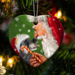 Schnauzer and Santa Clause With Candy Cane Christmas Ceramic Ornament