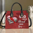  Cardinal D Printed Leather Handbag NH