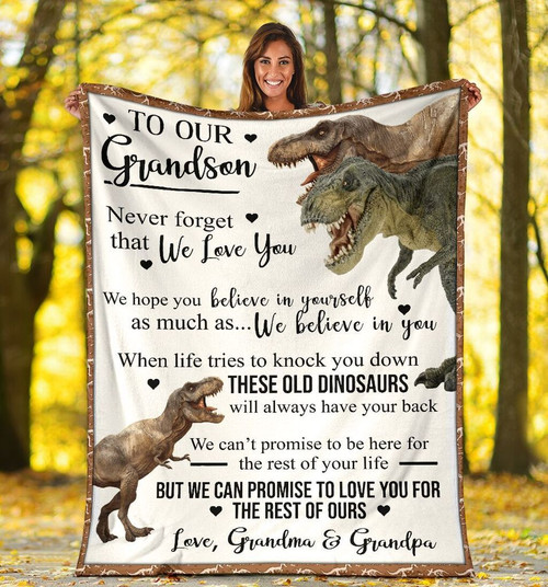 To Our Grandson Never Forget That We Love You We Hope You Believe In Your Self Dinosaur Fleece Blanket - Spreadstores