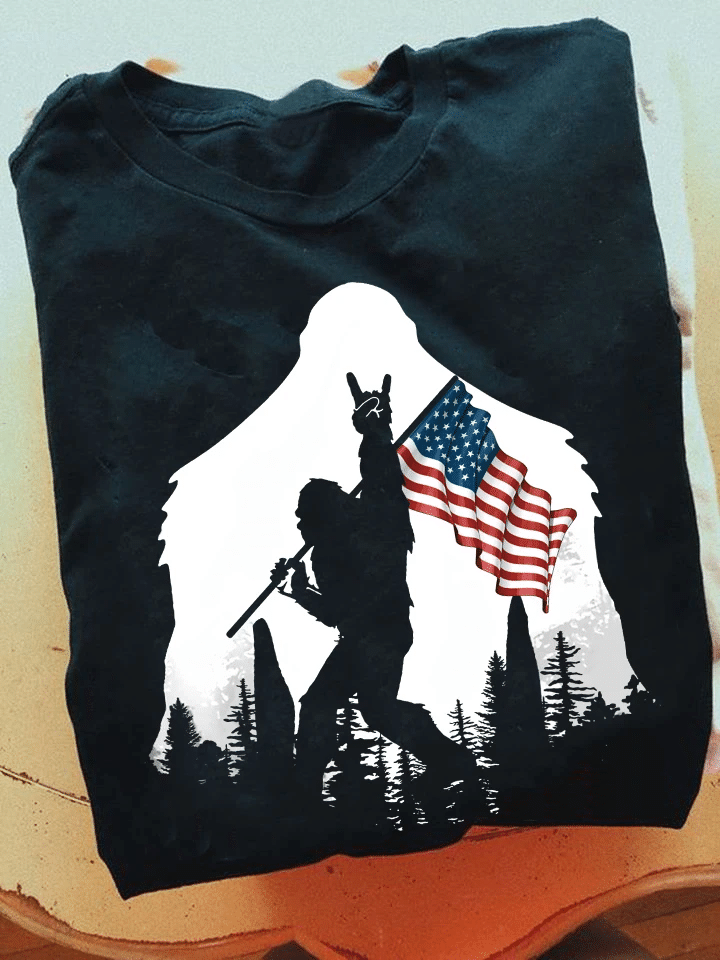 Bigfoot Rock And Roll USA Flag in The Forest T-Shirt - spreadstores