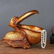 Pelican Storage Figurine
