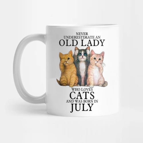 Never Underestimate An Old Lady Who Loves Cats And Was Born In Mug