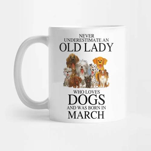 Never Underestimate An Old Lady Who Loves Dogs And Was Born In Mug
