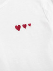 Women Button Back Heart Embroidered Rolled Cuff Top