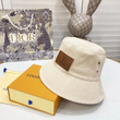 Louis Vuitton Cream Bucket Hat With Logo Label
