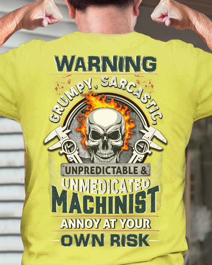 Machinist Skull T-Shirt – Yellow Tee with Bold Black Skull Graphic and Sarcastic Quote: WARNING SARCASTIC GRUMPY UNPREDICTABLE & UNMEDICATED MACHINIST ANNOY AT YOUR OWN RISK