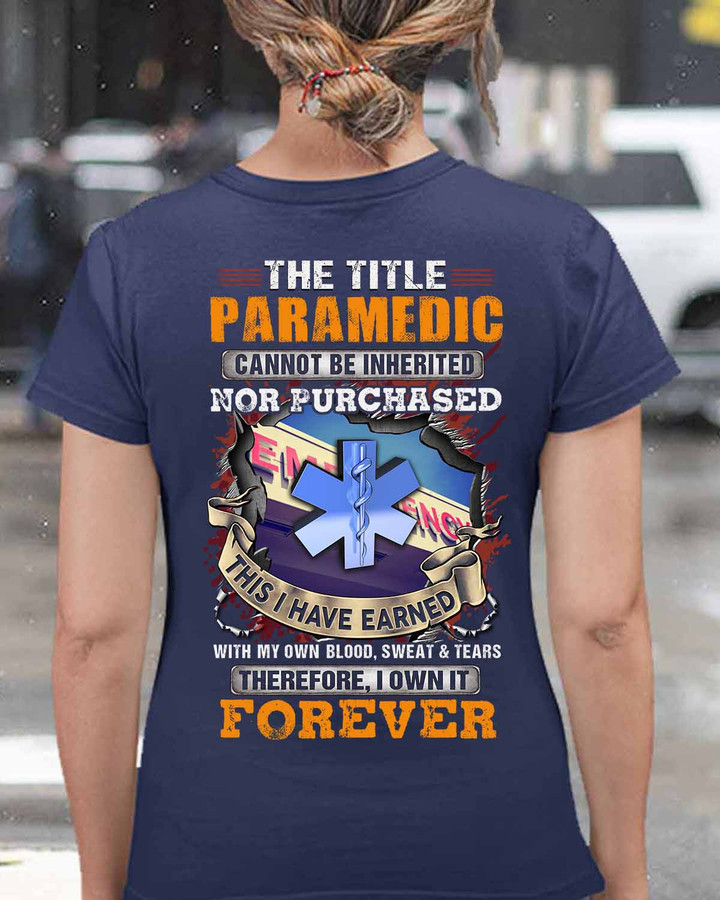 Paramedic T-Shirt with 'The Title Paramedic Cannot be Inherited nor Purchased, I Have Earned' graphic design, showcasing pride and ownership in the profession