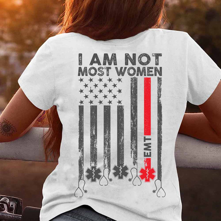 White EMT t-shirt with "I AM NOT MOST WOMEN" text, perfect for empowering female emergency medical technicians.