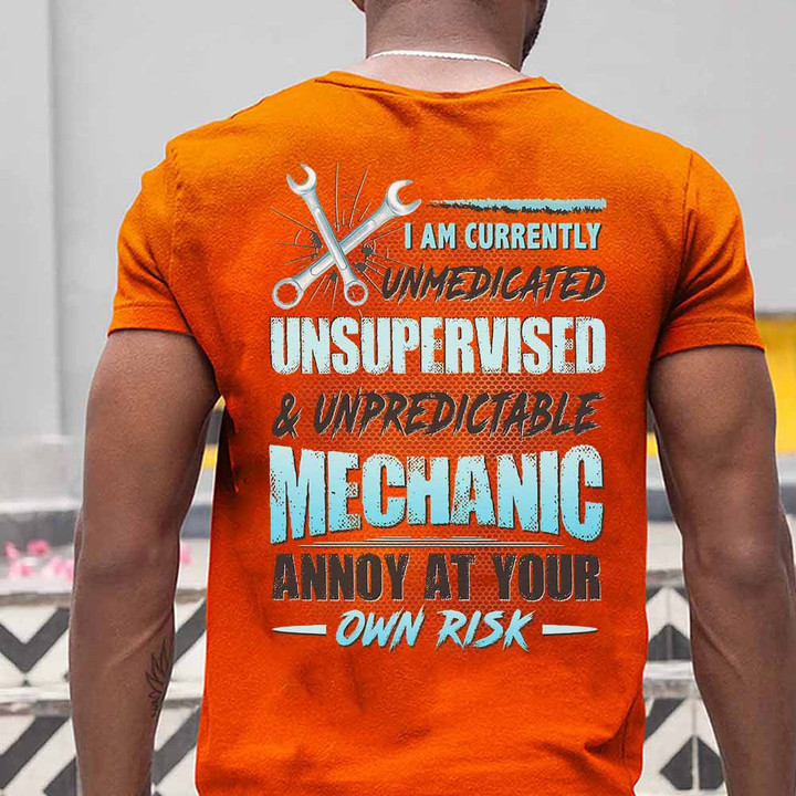 Orange mechanic t-shirt with humorous quote - Unmedicated, Unsupervised & Unpredictable - perfect for mechanics who like to make a statement.