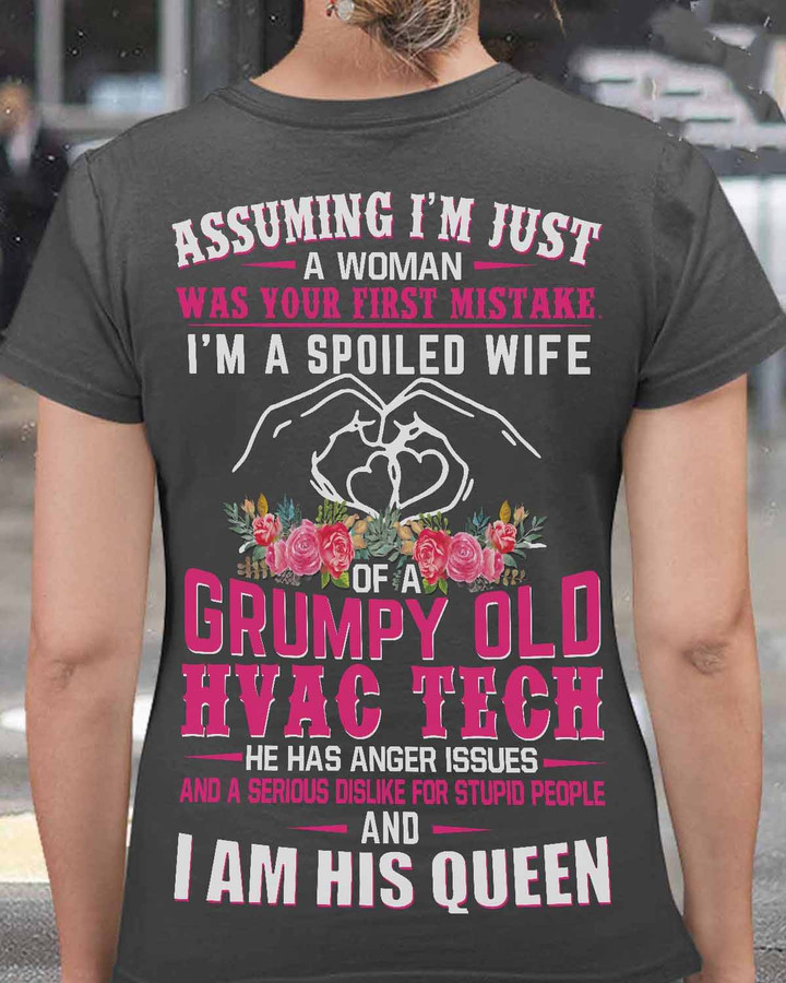 Black t-shirt with white text, 'Assuming I'm Just a Woman Was Your First Mistake'. Ideal for the spoiled wife of an HVAC tech. Empowering and humorous.