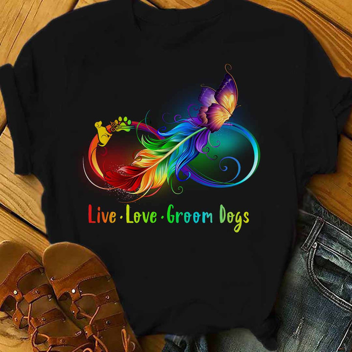 Black t-shirt for dog groomers with rainbow feather and butterfly design - Live Love Groom Dogs.