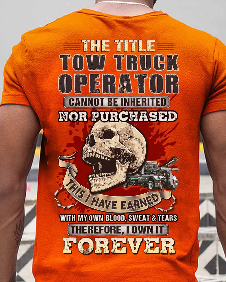 Orange t-shirt with black skull and tow truck graphic, proudly displaying the title of a tow truck operator.