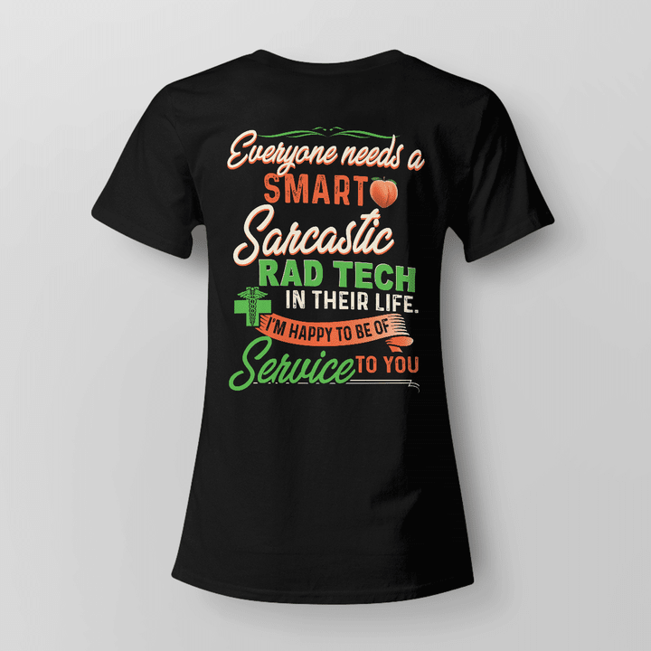 Black T-shirt with graphic design featuring a silhouette of a rad tech with crossed arms and a stethoscope, accompanied by the quote 'Everyone needs a smart sarcastic rad tech in their life. I'm happy to be of service to you.'