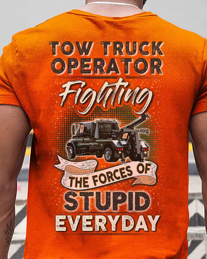 Tow Truck Operator T-Shirt - Graphic of a tow truck with the text 'TOW TRUCK OPERATOR FIGHTING THE FORCES OF STUPID EVERYDAY' printed above it.