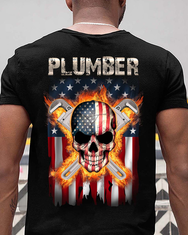 Black plumber t-shirt with American flag skull graphic and crossed wrench design.