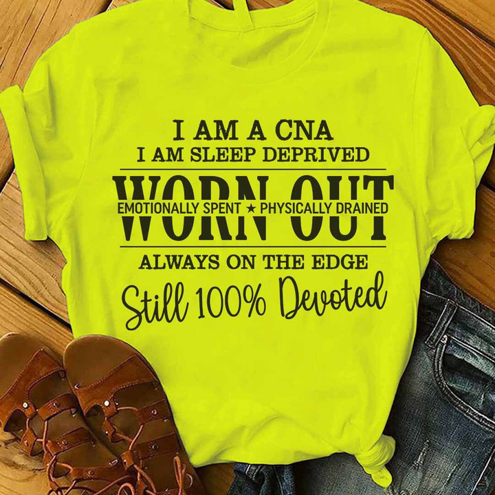 Yellow ladies CNA t-shirt with bold 'I AM A CNA I AM SLEEP DEPRIVED WORN OUT' design showcasing dedication and commitment.
