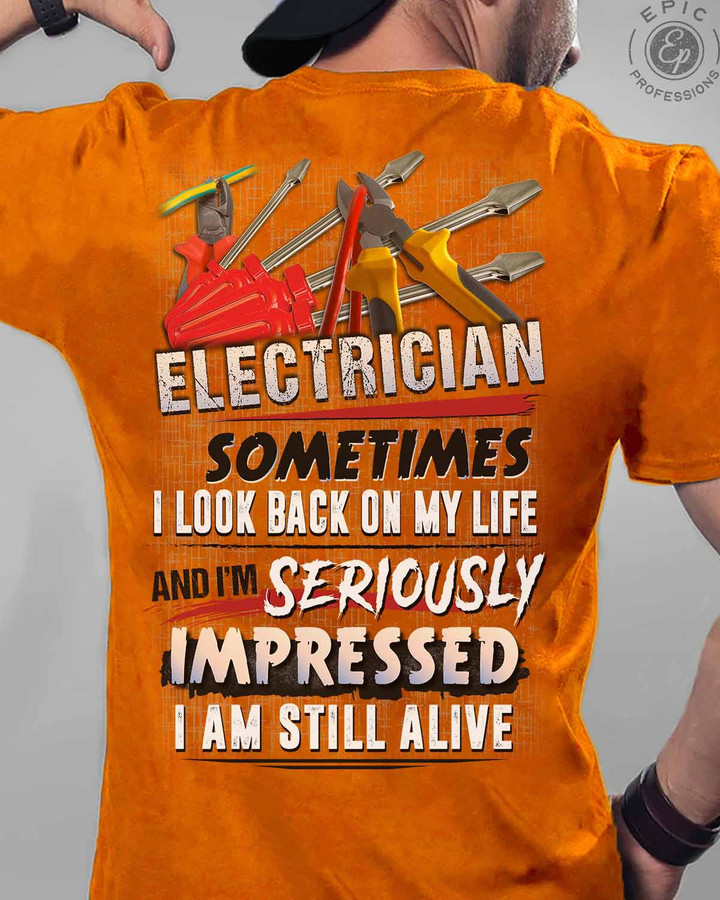 Electrician T-Shirt - Orange tee with white quote print, perfect for electricians to show their pride.