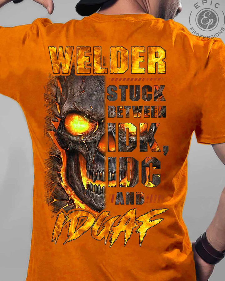 Orange t-shirt for welders with skull graphic and 'Welder Stuck Between' quote