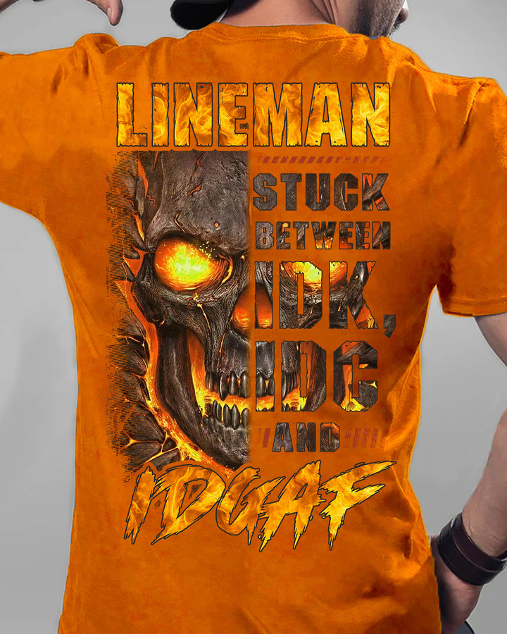 Orange Lineman T-Shirt with Skull Graphic - Stuck Between a Rock and a Hard Place