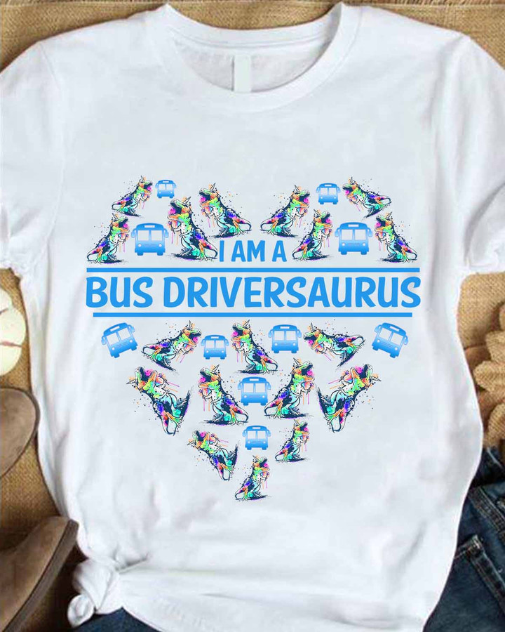 White cotton t-shirt with graphic design of a friendly T-Rex wearing a bus driver's hat, showcasing pride for bus drivers.