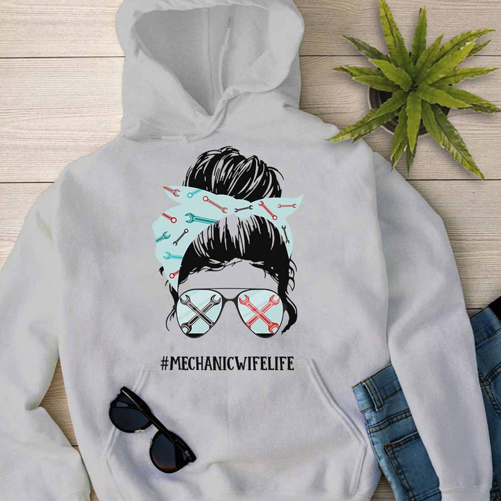 White hoodie with graphic design of a woman wearing sunglasses and a bandana, representing the Mechanic's Wife Life.