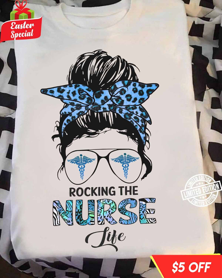 White t-shirt with blue leopard print headband and sunglasses graphic, representing the nurse profession