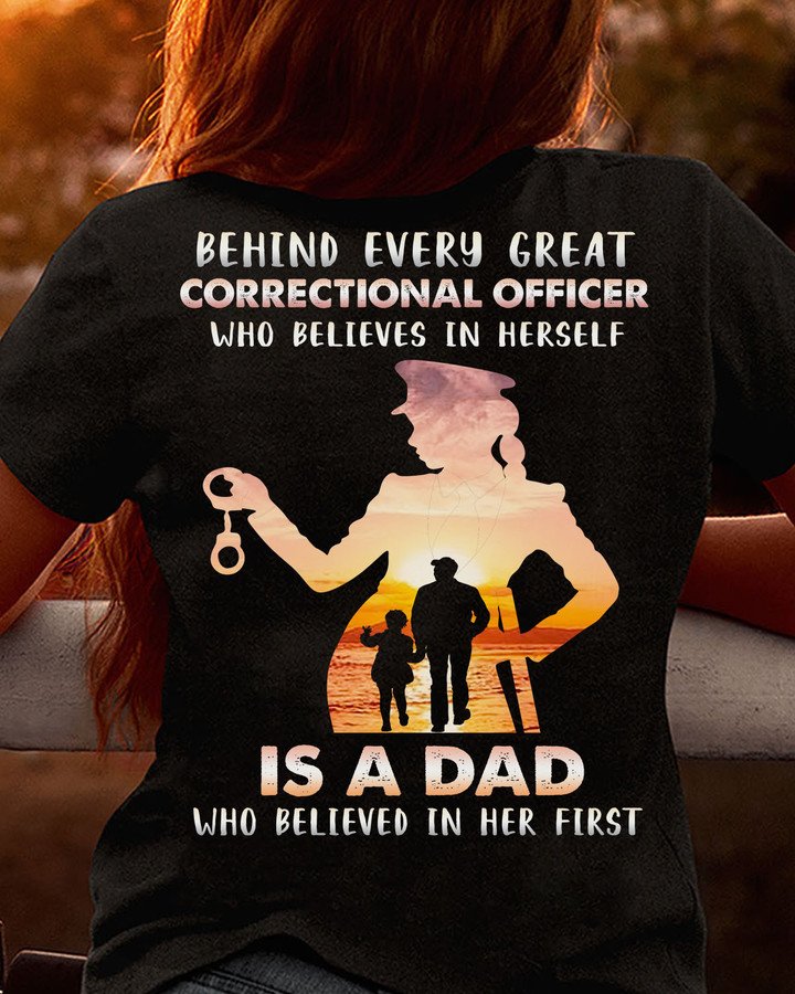Black cotton t-shirt with white text, paying tribute to Correctional Officer fathers and their role in their daughters' success.