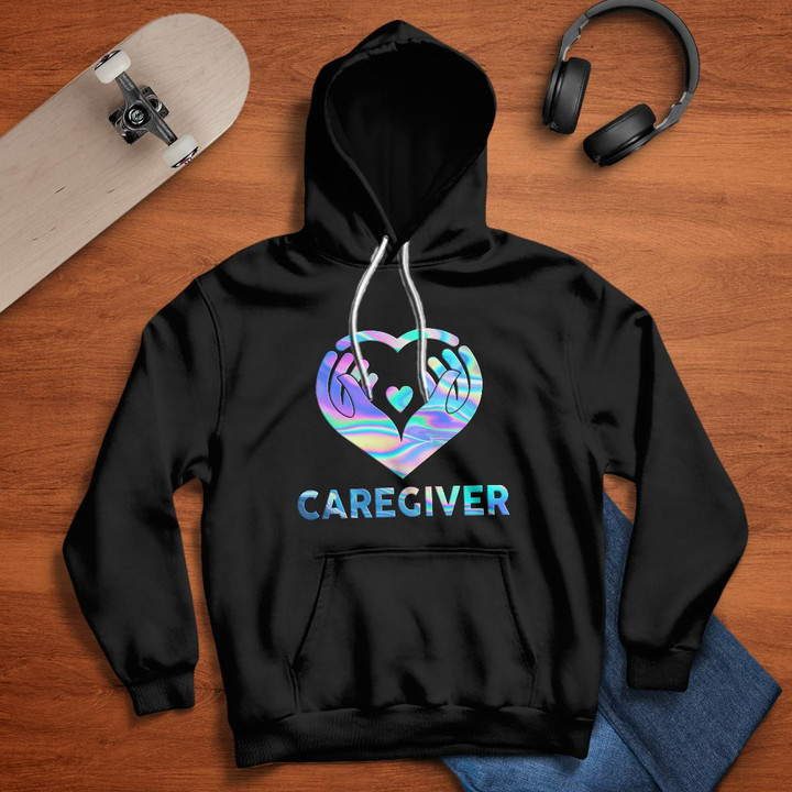 Black hoodie with graphic design of hands holding a heart, representing the caregiver profession