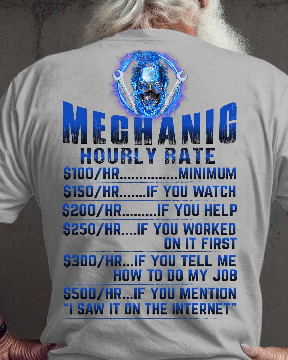 Gray mechanic t-shirt with skull wearing a hard hat and gripping a wrench, symbolizing skilled mechanics and their hourly rate.