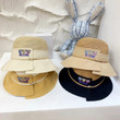 Moschino Logo And Teddy Bear Print Straw Bucket Hat In White Yellow