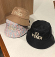 Fendi Ff Logo Embroidered Nylon Bucket Hat In Black