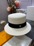 Chanel White Logo Embossed On Black Band Bucket Hat In White