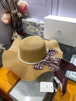 Christian Dior Pearl Bow Band Wavy Brim Bucket Hat In Brown