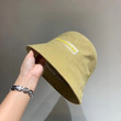 Balenciaga Yellow Embossed Logo In Leather Bucket Hat In Beige
