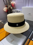 Chanel White Logo Embossed On Black Band Bucket Hat In Cream
