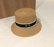 Chanel Camellia And Interlocking C Logo In Band Bucket Hat In Brown